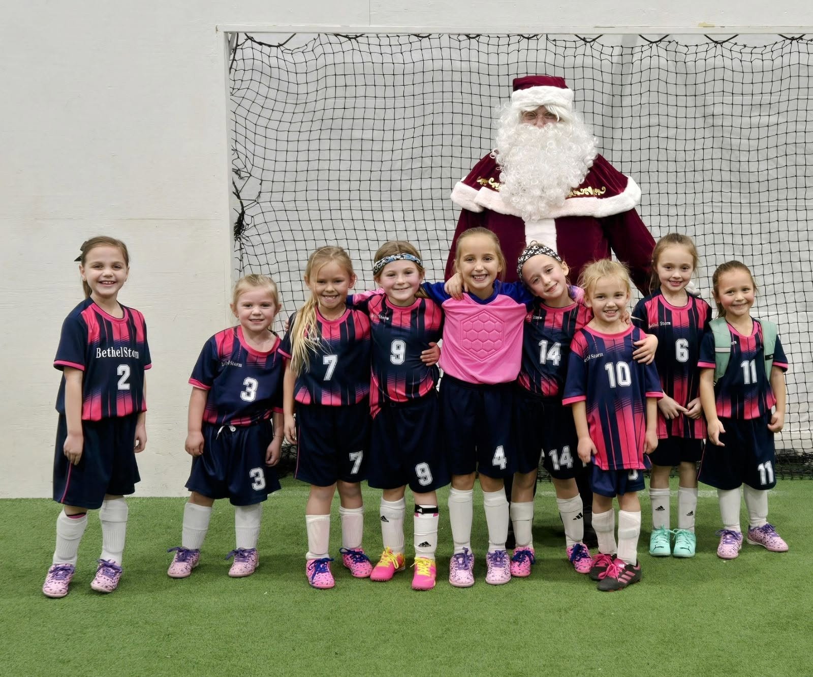Bethel girls soccer team with Santa